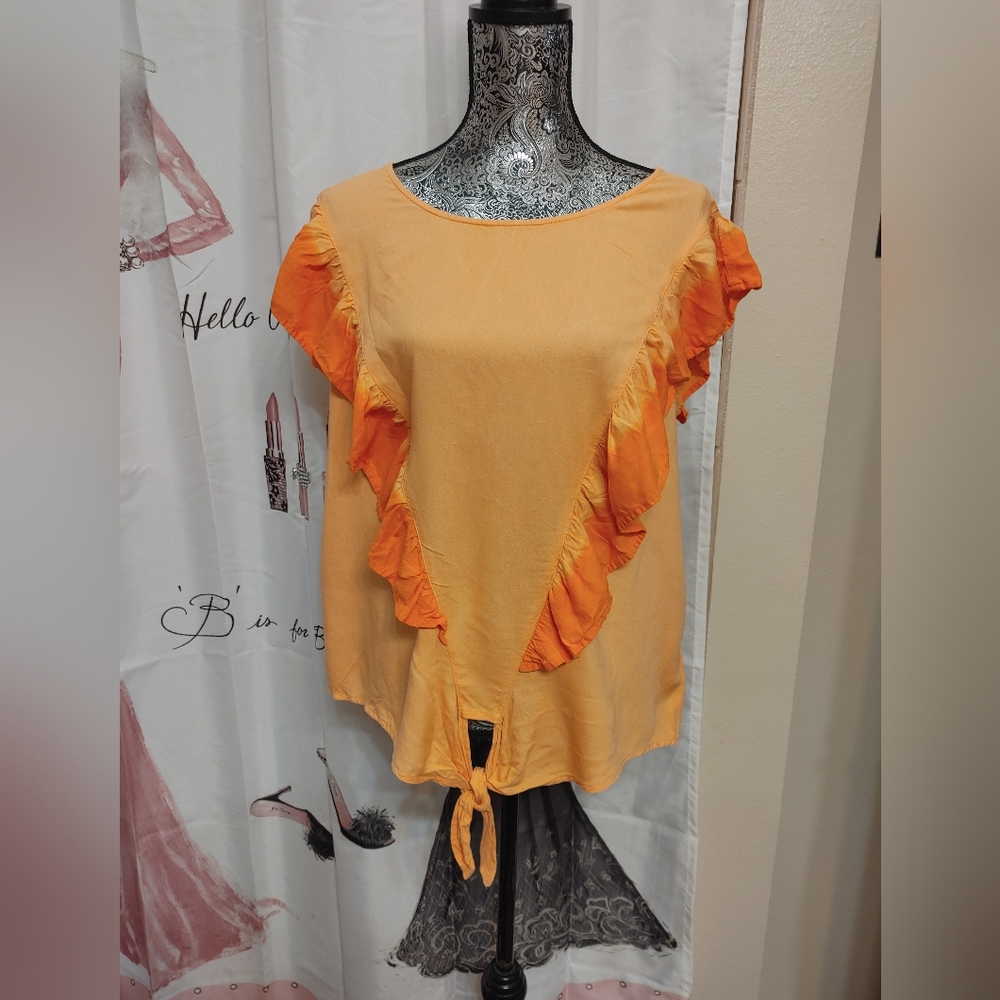 ANA Large Ruffle Front Top